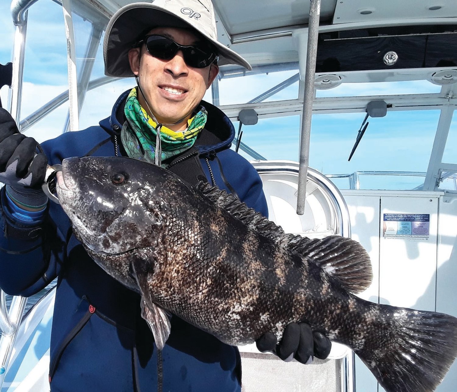 TAUTOG SEASON: Jamie Wong with a tautog caught in the fall off Newport. Tautog season opened with a three fish/person/day limit (16-inch minimum size) this week in Rhode Island and Massachusetts.